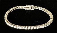 Sterling silver tennis bracelet w/clear stones
