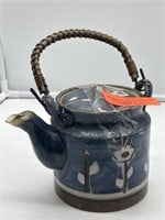 Handmade blue tea pot. Pottery