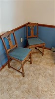 Pair of vintage oak padded chairs