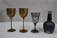 Two 8" brass goblets, one 6" silver plate goblet