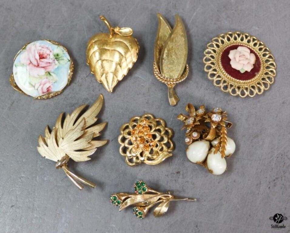 Brooches / 8 pc