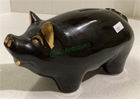 Vintage ceramic pig bank measuring 4 1/2 inches