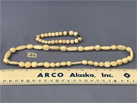 Necklace and bracelet set, a 20" strand of irregul