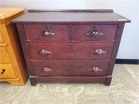 4-DRAWER CHEST W/ CARVED PULLS