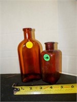 2 vintage amber brown glass bottles