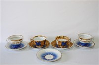 Pair of Meissen Cups and Saucers, together with