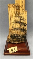 3.75" fossilized ivory scrimshaw of a sailing ship