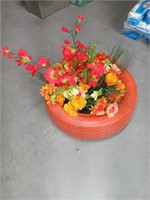 Orange tire floral decor