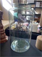 Large glass jar.