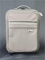 DELSEY ROLLING LUGGAGE (MISSING A ZIPPER PULL)