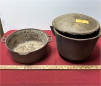 2 cast-iron pots one has lid