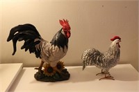2 chicken statues