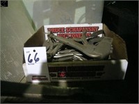 Box of assorted welding clamps