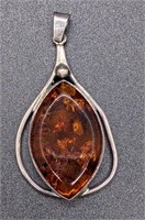Sterling Silver Rimmed Amber Fashion Pendant