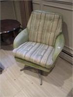 vintage MCM green swivel chair