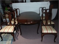 Cherry oval table and 6 stripped seat chairs 66"