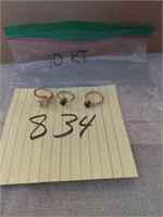 Three 10 kt gold rings