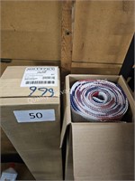 2- rolls of red, white & blue material (no info)