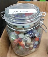 CANISTER OF ASSORTED MARBLES