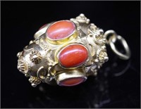 A large yellow gold and coral cannetille pendant