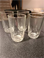 Set of 4 drinking glasses. Basement bar