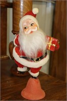 Vintage Santa Claus Figurine Standing on a Bell