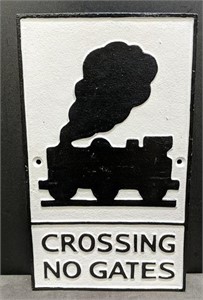 Crossing no gates cast iron sign