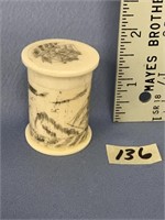 A small ivory container, highly scrimshawed with s