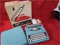 Vintage smith Corona typewriter w/ box.