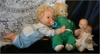 2 Large Dolls with movable eye lids, 2 baby dolls