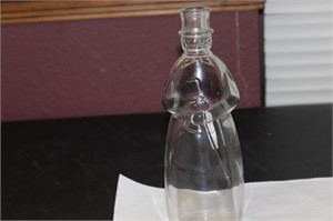 A Figureal Decanter Bottle