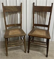 (2) Antique Oak Carved Cane Bottom Dining Chairs