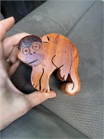 Wooden puzzle, box, monkey, and elephant