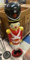 Tall plastic Christmas toy soldier figure - has a