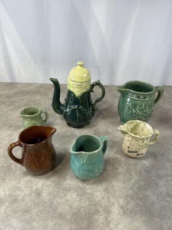 Assortment of Pottery pitchers