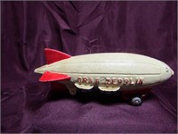 Vintage Cast iron Graf Zepplin toy. Painted.