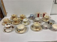 Tea cups & saucers. Mugs.