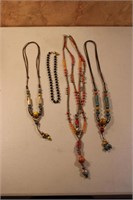Four mulit colored necklace lot