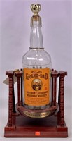 "Old Grand-Dad" Whiskey bottle and stand, 24" tall