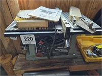Delta 10" bench/table saw w/ materials roller