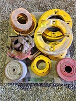 pallet of tractor tire weights, clutches