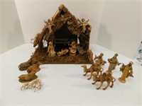 Nativity Scene 12" T, 15" W, 8" D. Figurines made