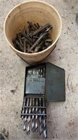 Bucket of drillbits, and a box of graduated sizes