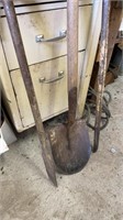 Two iron digging bars, and a spade shovel, the