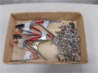 assortment of clamps and wing nuts