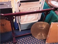 Asian-style decorative gong and a beach chair,