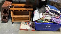 3 wooden shelves, tub full of fabric, spools of