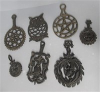 (7) Cast Iron Trivets Including (5) 6"-9" L and