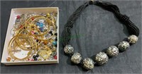 Jewelry lot - gold tone bracelets, beads, gold