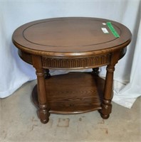 Oval side table 26 1/2"W 20 1/2"L 21 1/2"H